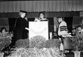 Photograph: [President Vivian Blevins presents Rep. Wilhelmina Delco with an hono…