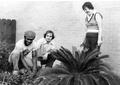Photograph: [Instructor Gardening with Hearing-Impaired Students]