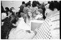 Photograph: [Photograph of Students at Registration in the Band Hall]