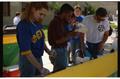 Primary view of [Students working a drink booth at PACfest]