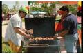 Primary view of [Men grilling at PACfest]