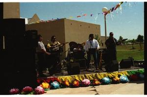 Primary view of object titled '[Band performing on stage at PACfest]'.