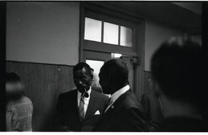 Primary view of object titled 'Image inside courthouse during trial related to 1964 civil rights protest'.