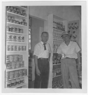 Primary view of object titled 'Bill McVay and unidentified man in store'.