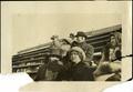 Photograph: [People on wooden bleachers on Simmons College campus]