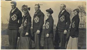 [Six students wearing Simmons Class of '15 letter jackets]