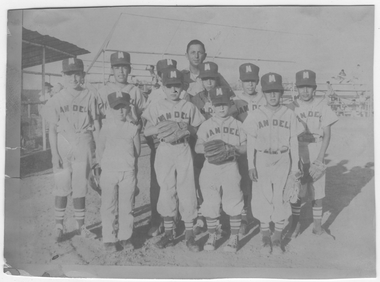 A teenage boy's little league baseball team portrait in the 1940's