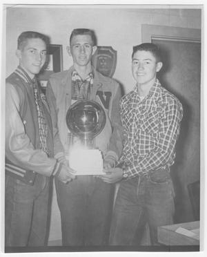 Dwayne Thomason, James Hutchinson, and Charles Dees with basketball trophy
