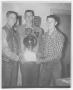 Photograph: Dwayne Thomason, James Hutchinson, and Charles Dees with basketball t…