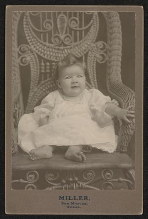 [Portrait of an Unknown Baby in a Wicker Chair]
