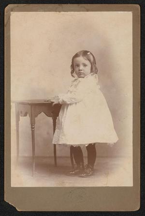 [Portrait of an Unknown Girl Next to a Table]