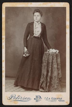 [Portrait of an Unknown Woman Holding Flowers]