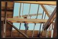 Photograph: [Workers Viewed through Unfinished Roof #2]