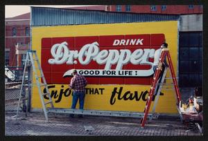 Primary view of object titled '[Artists Completing Dr. Pepper Mural]'.