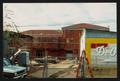 Thumbnail image of item number 1 in: '[Courtyard View from Behind a Fence of The Dr. Pepper Museum]'.
