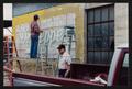 Thumbnail image of item number 1 in: '[Photograph of Painters Restoring Dr. Pepper Mural]'.