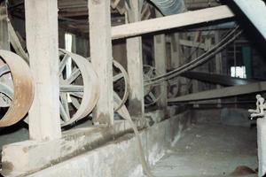 Primary view of object titled '[View of the Line Shaft at the Burton Farmers Gin]'.
