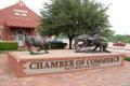 Photograph: Weatherford Texas Chamber of Commerce Building and Statues