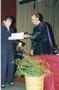 Photograph: Honors Day, Linda Vingless accepts an academic award from Dr.David Ja…