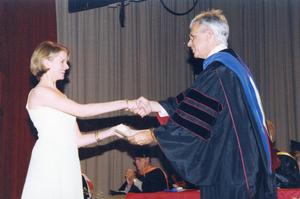Honors Day, Jennifer Richardson receives an award from Dr. Jackson Sasser for achievements in theater arts