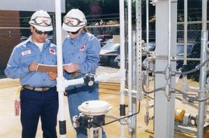 Instrumentation: Manuel Chavita and Dedra McLelland trace lines in the pilot plant.