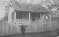Thumbnail image of item number 1 in: '[The McNabb house. One story, white, wooden house.]'.