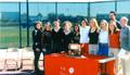 Thumbnail image of item number 1 in: 'Tennis team at an event'.