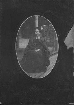 Primary view of object titled '[Carry Nation sitting on her porch]'.