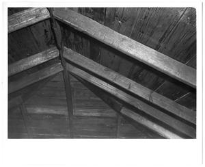 [Interior shot of roof rafters]