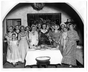 Costumed Women With Punch Bowl