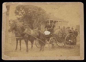 Primary view of object titled '[Hume F. Worsham Driving Waco Fire Engine No. 1]'.