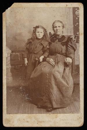 [A Woman and Young Girl Pose for a Portrait]