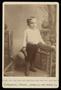 Photograph: [Portrait of a Child Standing on a Chair]