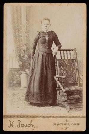 [An Unidentified Woman Posing with a Rocking Chair]
