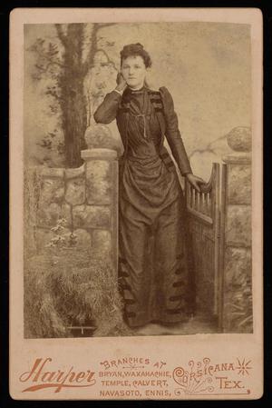 [Portrait of an Unidentified Woman Posing with a Gate]