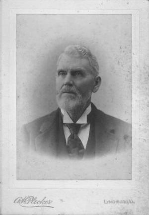 [Portrait of an older man with a white beard and a black tie]