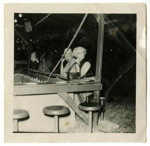 Primary view of object titled '[Mr. and Mrs. Sims McCutchan Jr. at Sam Houston Elementary School May Fete, 1950]'.