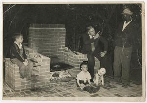 [Sims McCutchan, III, John Sanders, and John Taylor by Barbecue Grill]