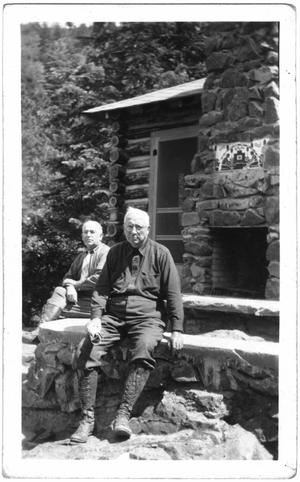 [Col. Hugh B. Moore and guest at the cabin]