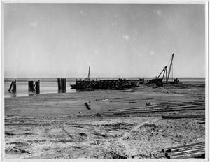 Primary view of object titled '[A view of the docks and pipelines under construction in Texas City in 1934]'.