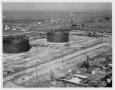 Thumbnail image of item number 1 in: '[An aerial view of American Oil storage tanks in Texas City in 1934]'.