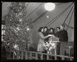 Photograph: [People in a Church at Christmas]
