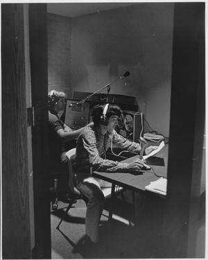 Primary view of object titled 'Two Students in the TCJC Radio Station'.