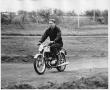 Photograph: Student Riding a Motorcycle