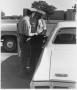 Photograph: Two TCJC Police Officers Writing a Motor Vehicle Citation