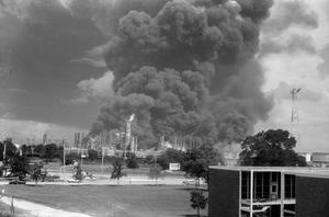 [Photograph of a Mobil Refinery Fire]