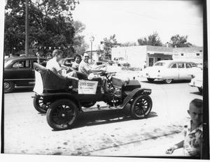 Primary view of object titled '[Davis Insurance Car in Parade]'.