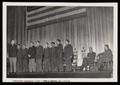 Photograph: [Soldiers Standing on Stage During Kingsbury Visit]