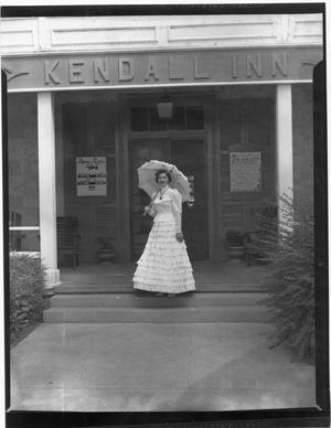 Primary view of object titled '[MayDelle Ratliff Outside Kendall Inn]'.