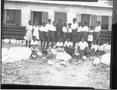 Photograph: [Group of Campers Outside Building]